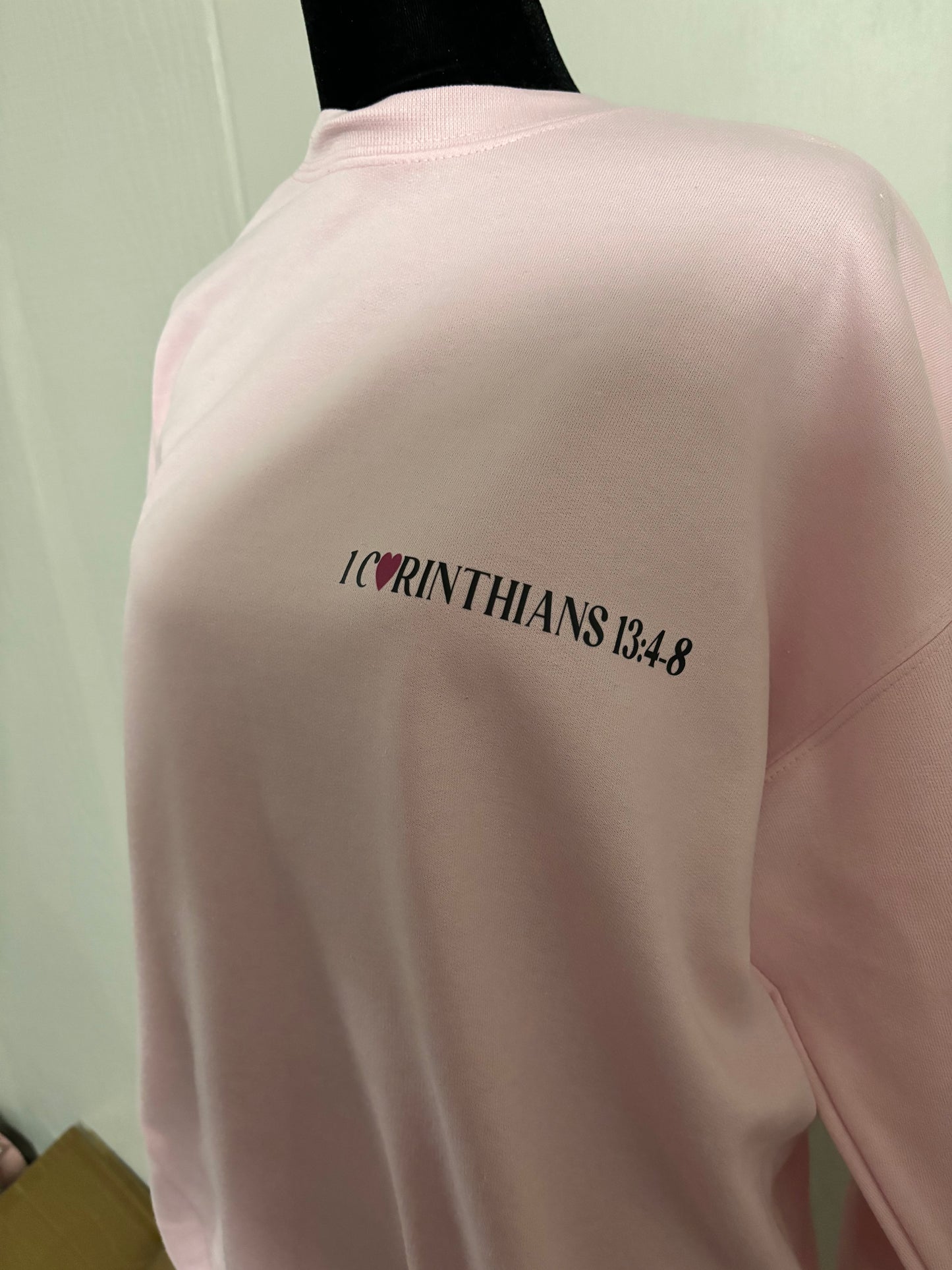 Love Never Fails Sweatshirt
