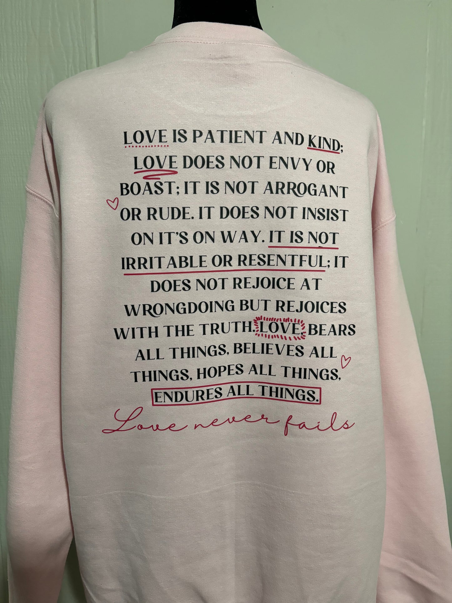 Love Never Fails Sweatshirt